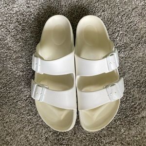 White EVA Birkenstocks.
